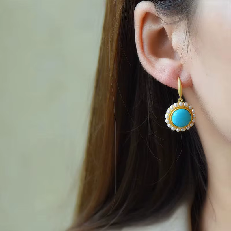 Ensemble de bijoux en argent incrusté de perles turquoises