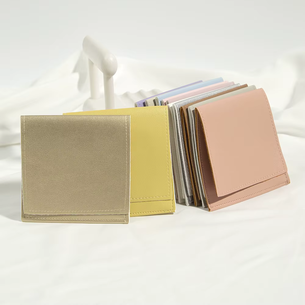 100 pochettes en cuir PU pour bijoux