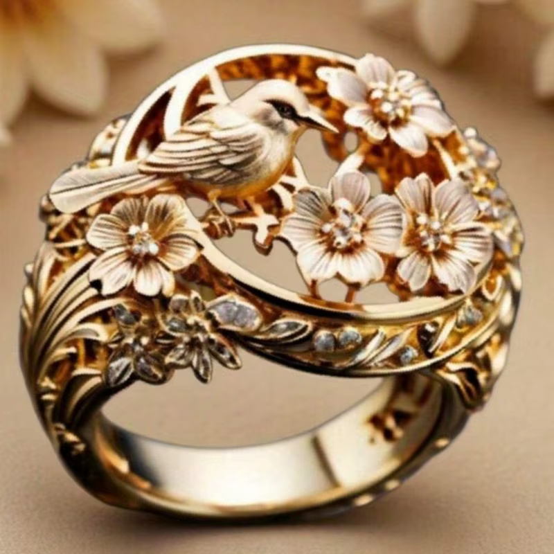 Bague sculptée style forêt campagnarde avec fleurs et oiseaux