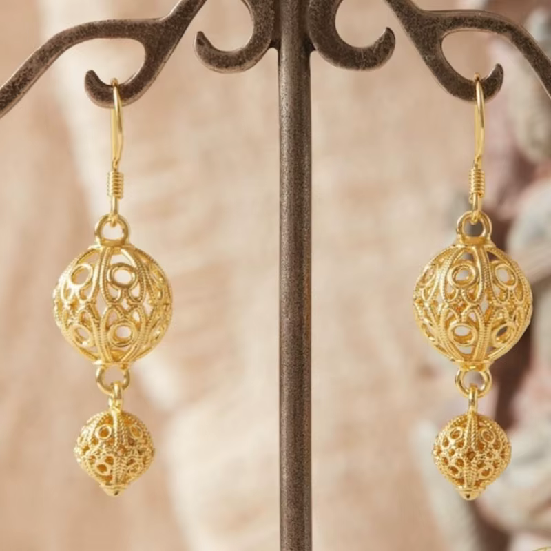Boucles d'oreilles pendantes artistiques rétro sculptées à la main