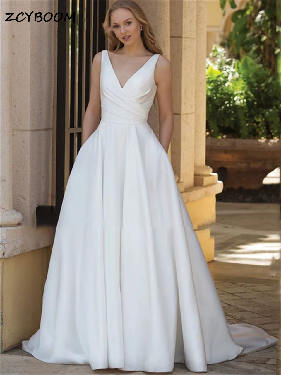 Magnifique robe de mariée blanche/ivoire à col en V avec poche 2026
