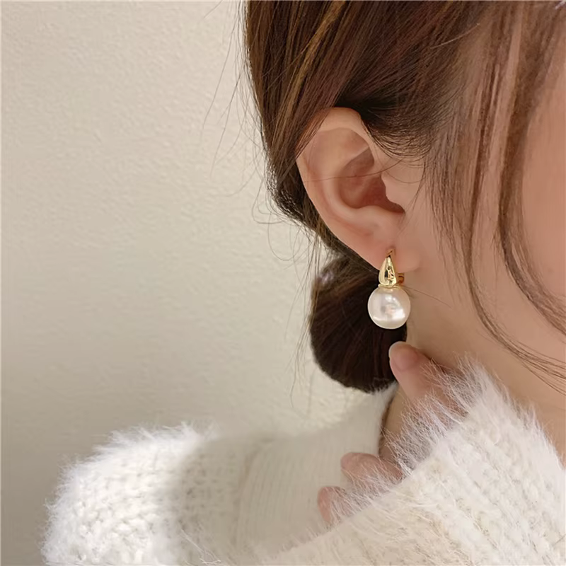 Boucles d'oreilles pendantes en perles de Champagne