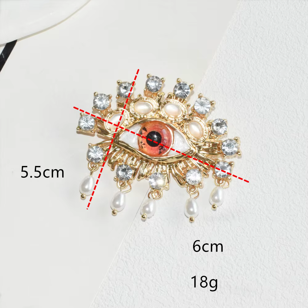 Broche Vintage en strass avec yeux en résine Orange pour femmes