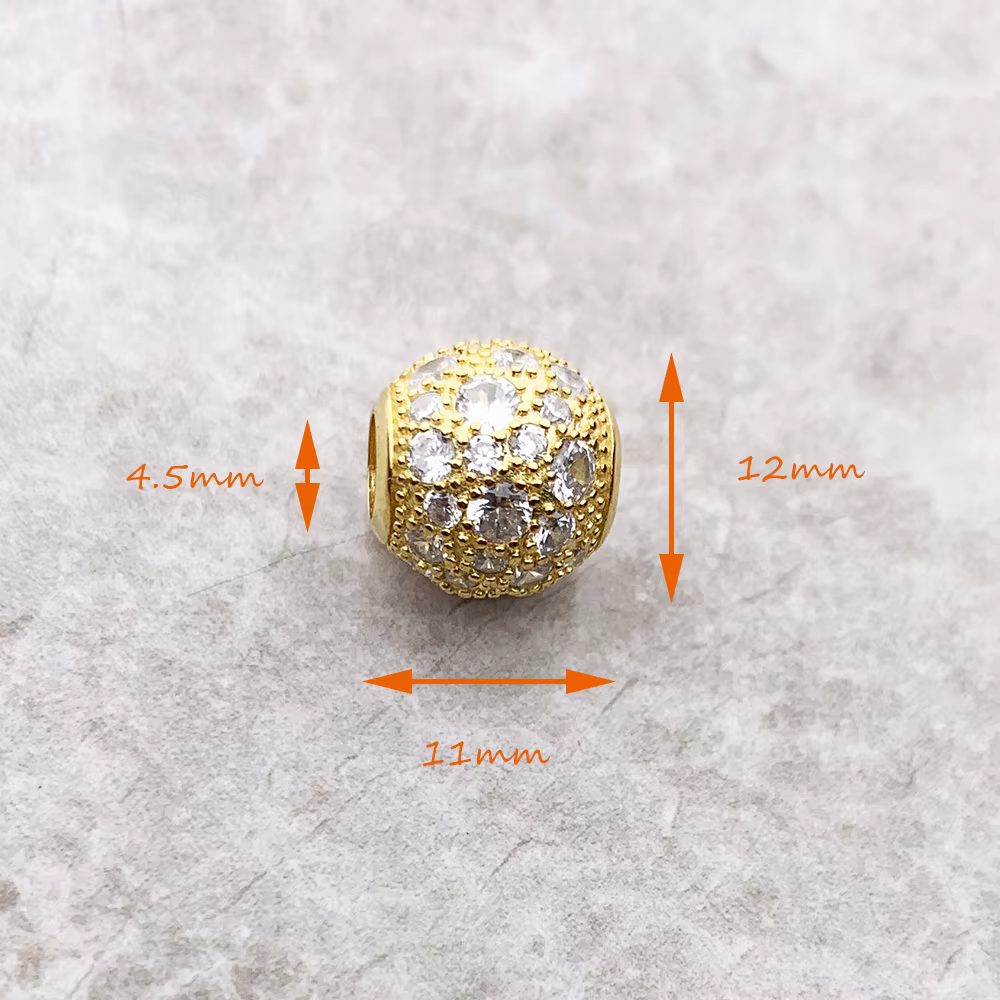 Perles dorées pavées écrasées