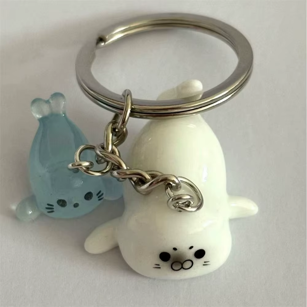 Mignon blanc 3D lumineux Lion de mer porte-clés clé pour femmes conception Simple Animal
