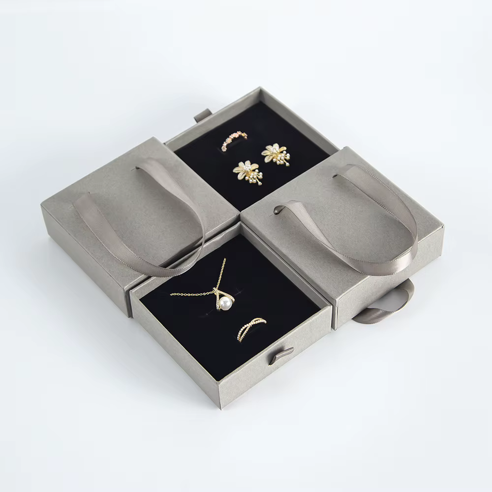 Boîte à bijoux portable avec poignée