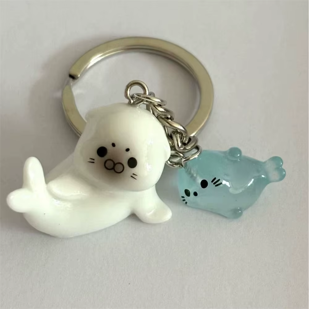 Mignon blanc 3D lumineux Lion de mer porte-clés clé pour femmes conception Simple Animal