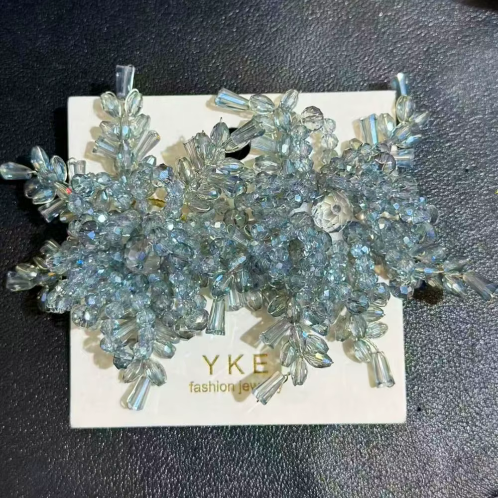 Boucles d'oreilles de mariée tendance en forme de flocon de neige