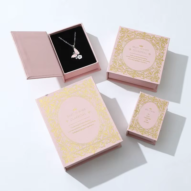 Boîte à bijoux magnétique en forme de livre