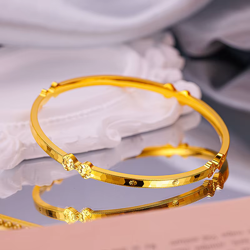 Bracelet fin Kt18 couleur or brillant avec nœud papillon
