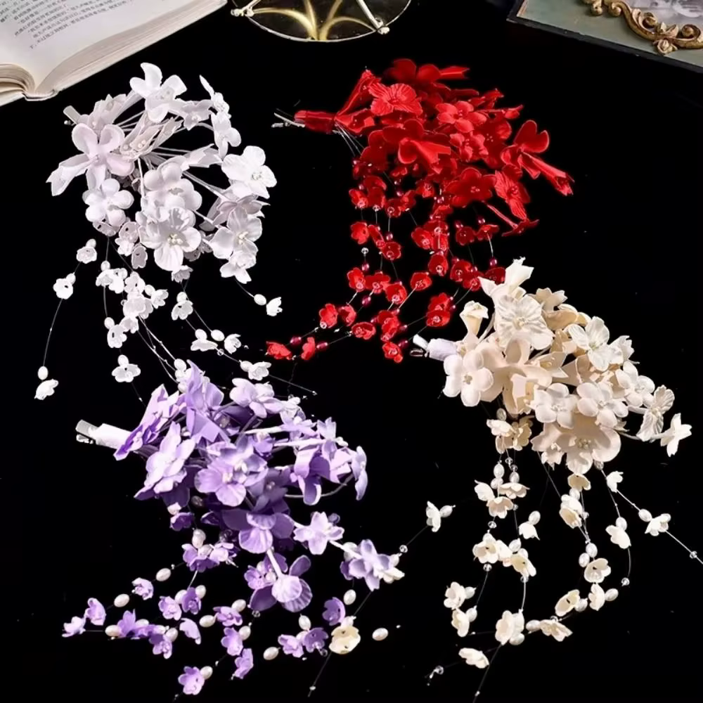 Barrettes à fleurs de luxe avec perles et pompons