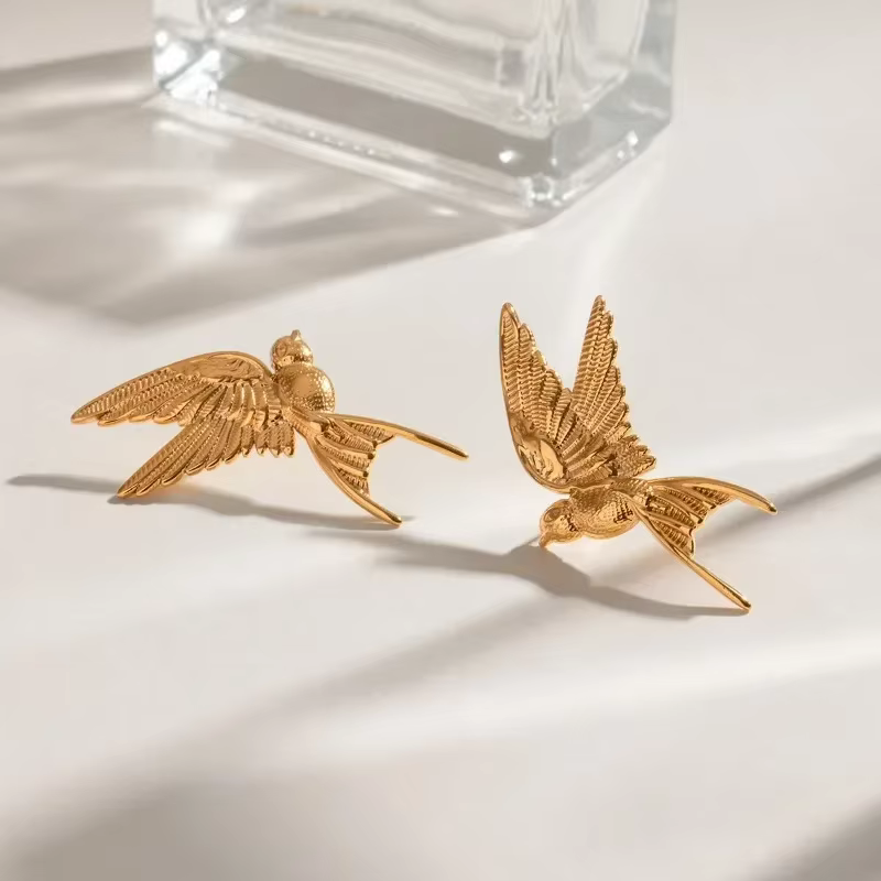 Minar Unique – boucles d'oreilles pendantes en forme de colombe de la paix