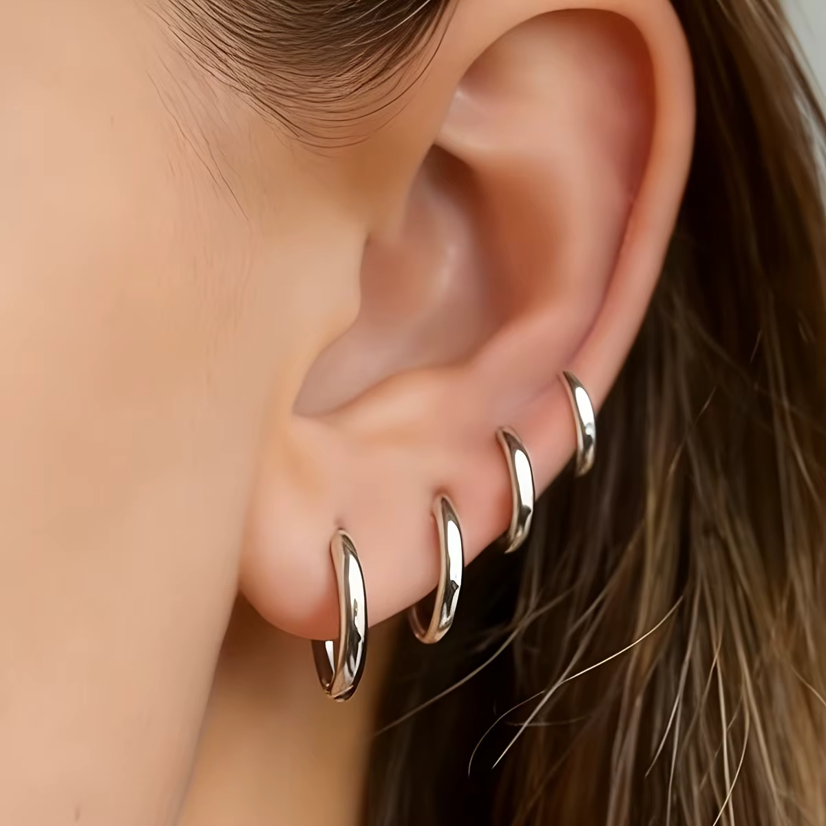 4 paires d'anneaux d'oreilles en titane plaqué or