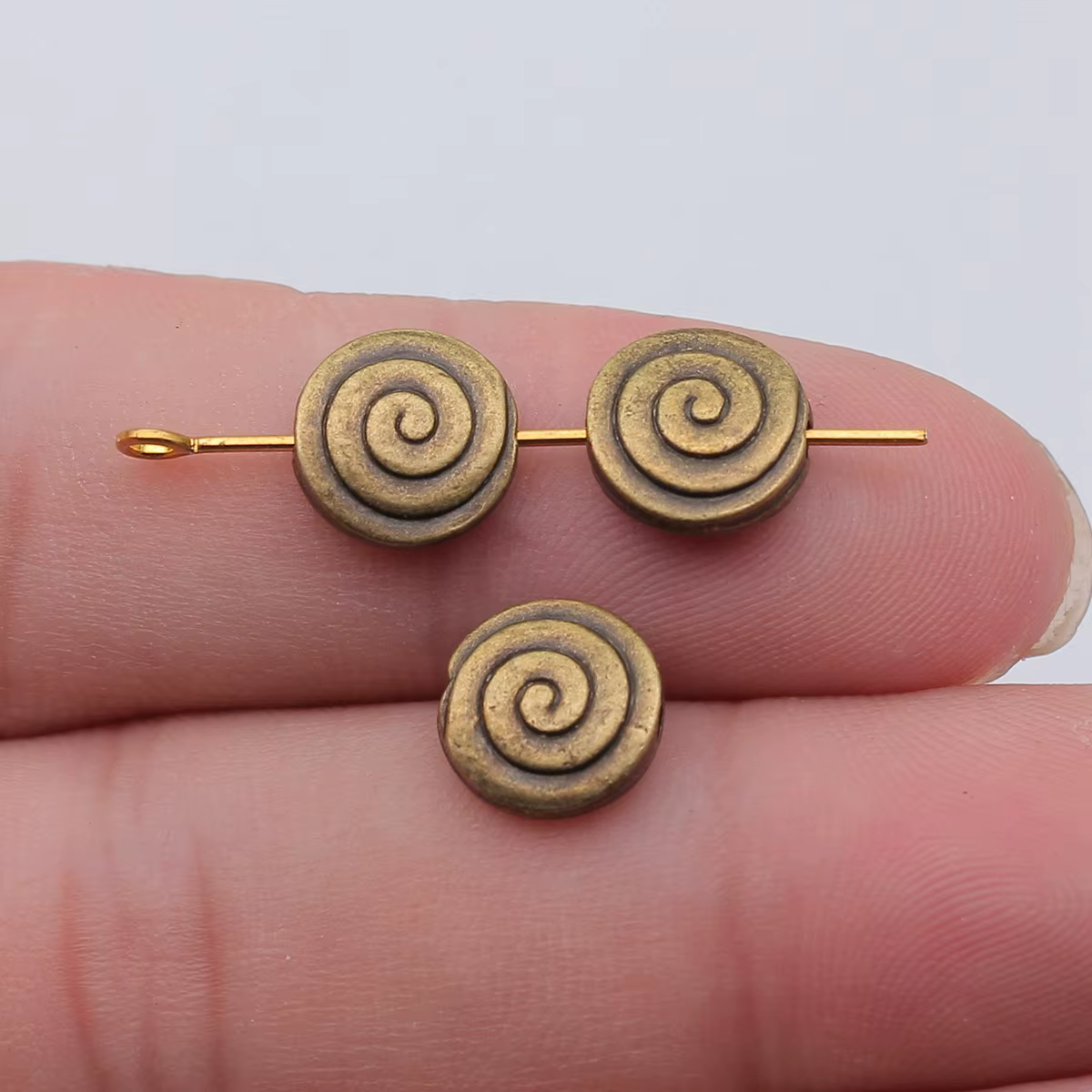 WYSIWYG 10 pièces accessoires de fabrication de bijoux bricolage artisanat Antique couleur argent 3x10mm tourbillon rond petit trou perles