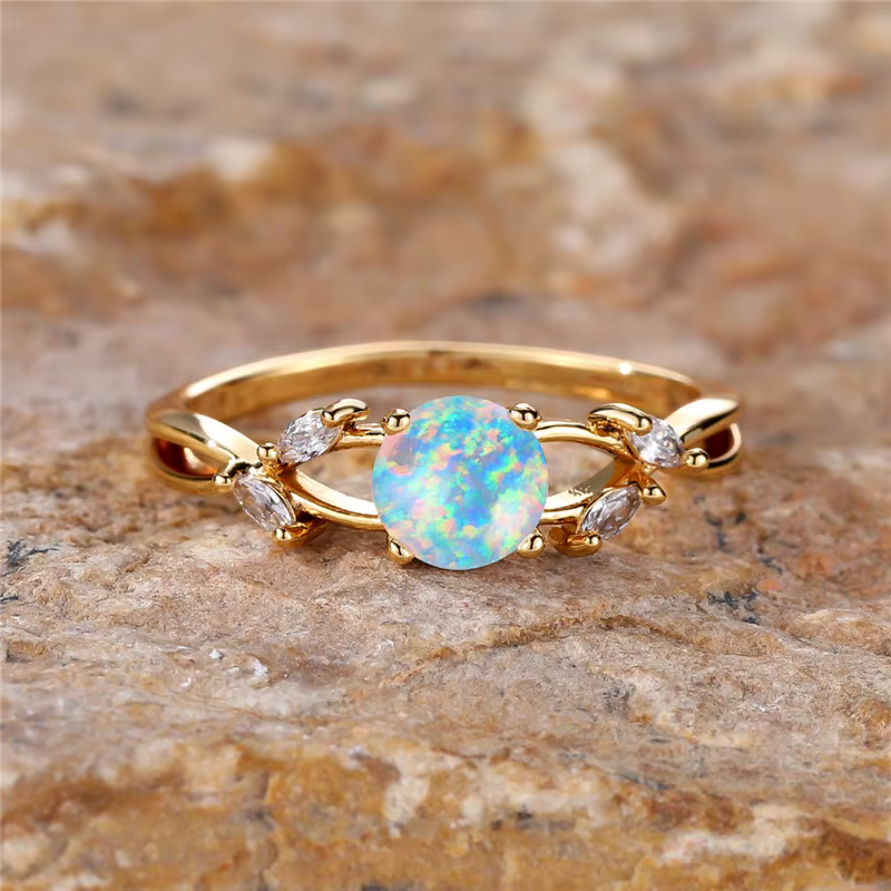 Bague en pierre d'opale de feu ronde blanche pour femme