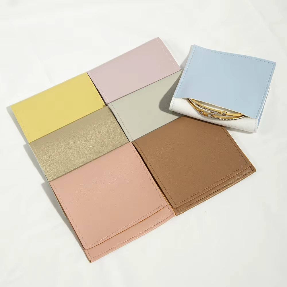 100 pochettes en cuir PU pour bijoux