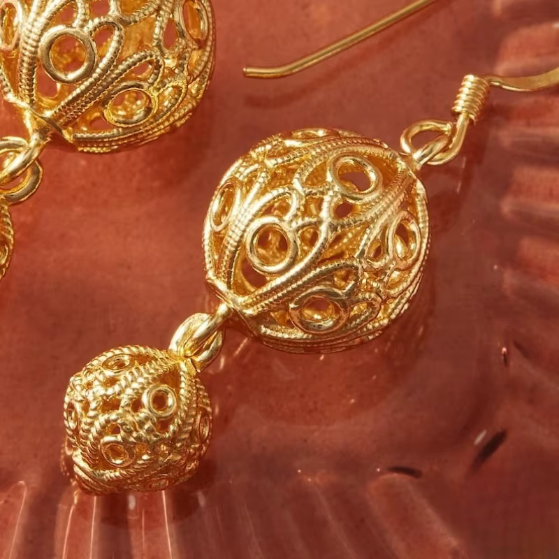 Boucles d'oreilles pendantes artistiques rétro sculptées à la main