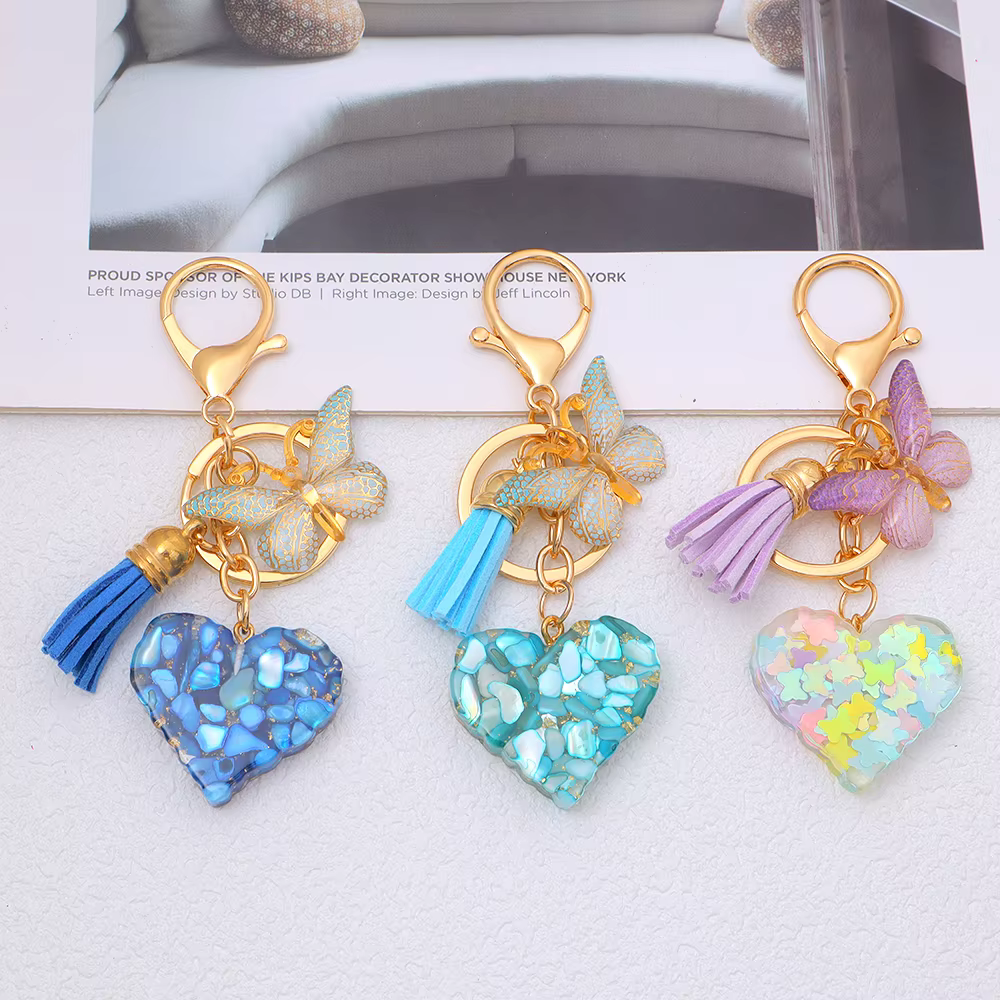 Porte-clés en forme de cœur en résine rempli de paillettes brillantes