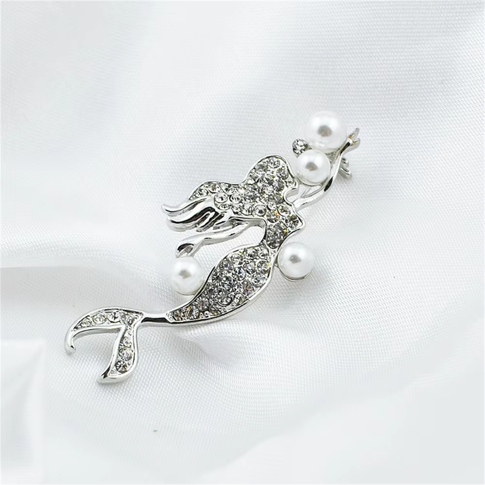 Broche sirène en perles de mer pour femmes