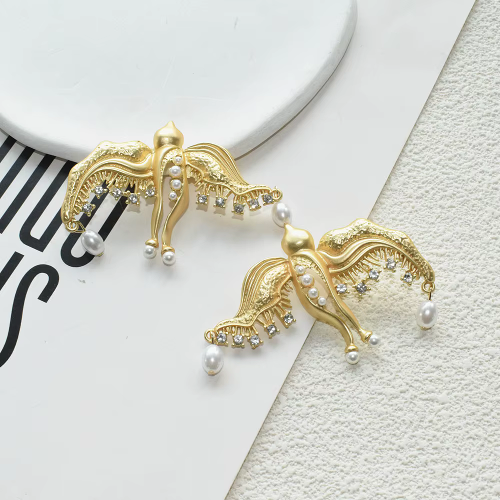 Mode femmes métal plaqué or colombe oiseaux boucles d'oreilles bijoux néo gothique déclaration accessoires