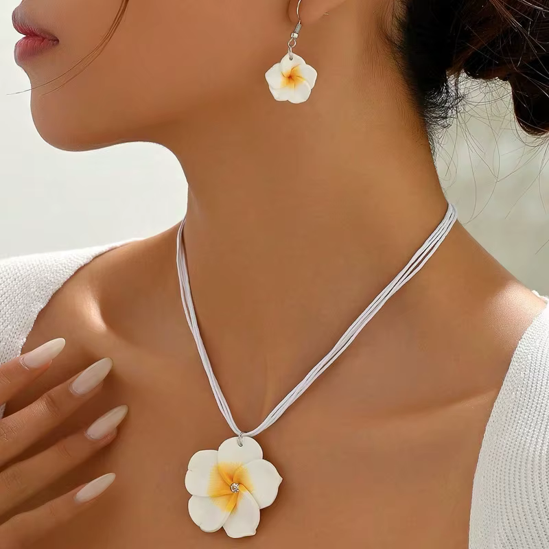 Nouvel ensemble de bijoux bohèmes tressés à grandes fleurs pour femmes