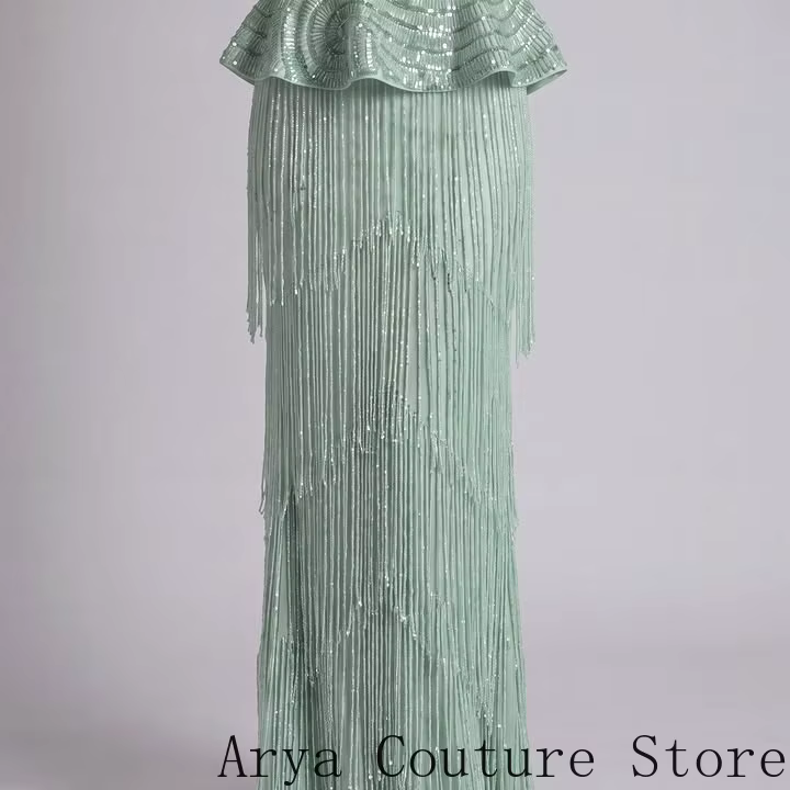 Robe de soirée sirène vert sauge frais avec franges