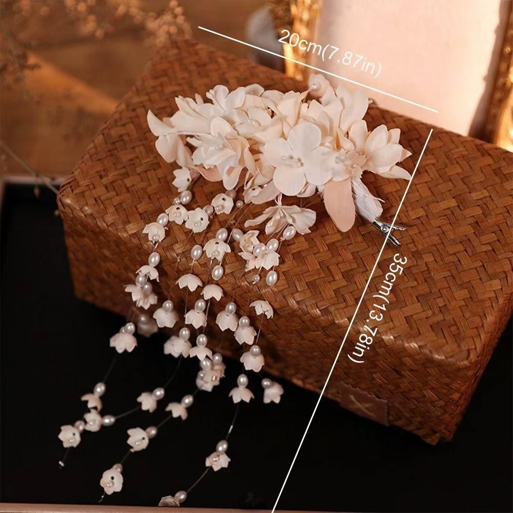 Barrettes à fleurs de luxe avec perles et pompons