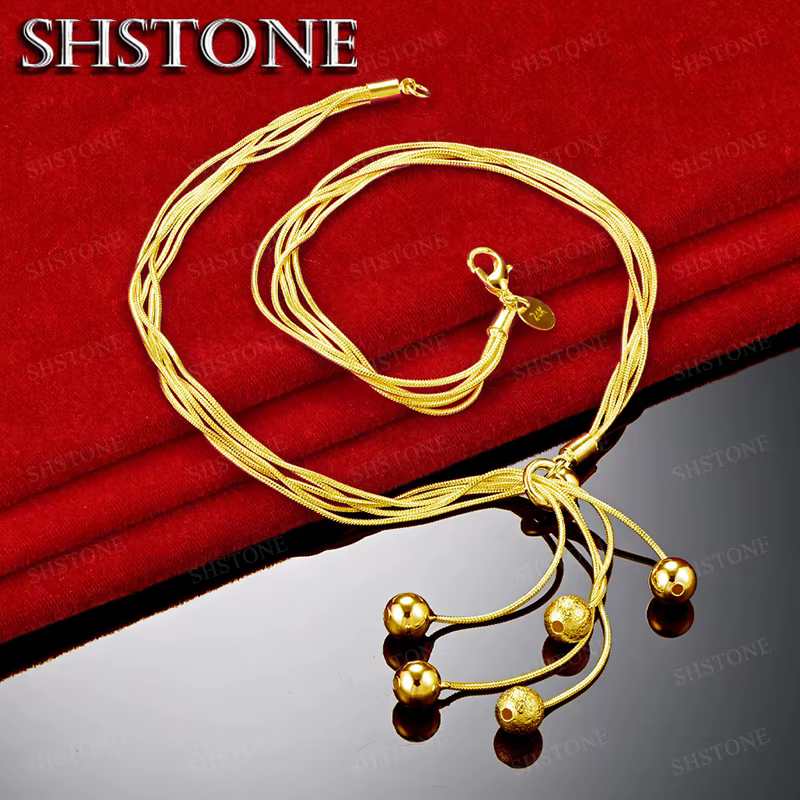 Collier en or 18 carats avec pendentif à cinq perles lisses givrées