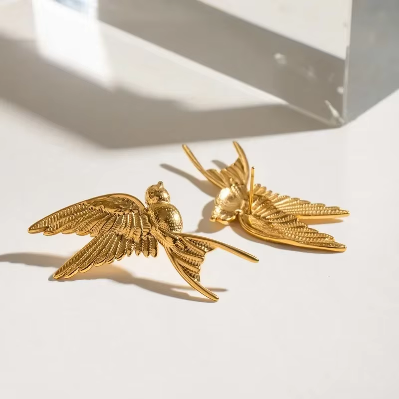 Minar Unique – boucles d'oreilles pendantes en forme de colombe de la paix