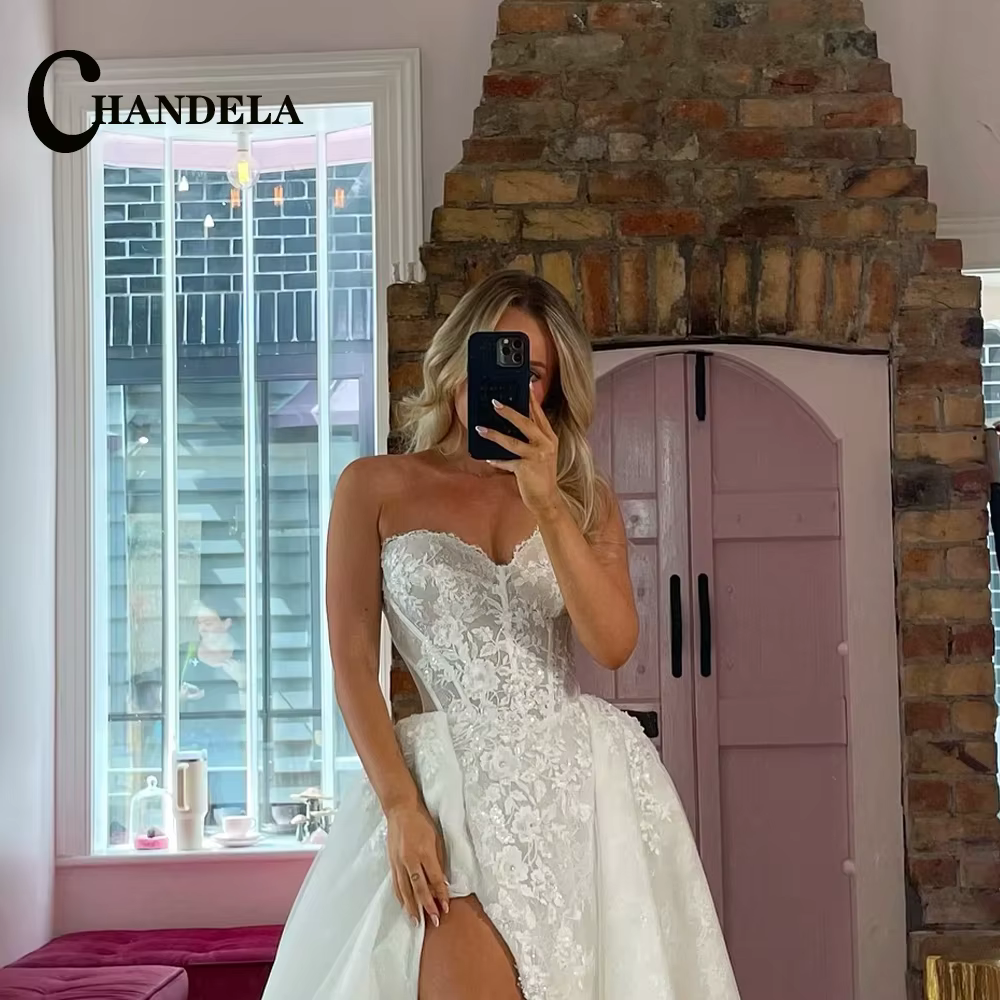 CHANDELA conte de fées fente robes de mariée sans manches plis laçage chérie brosse Train
