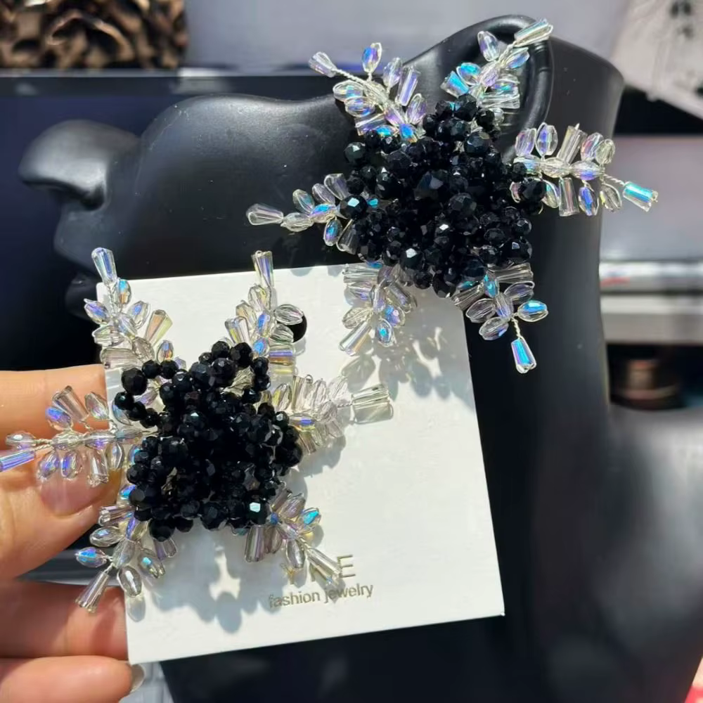 Boucles d'oreilles de mariée tendance en forme de flocon de neige