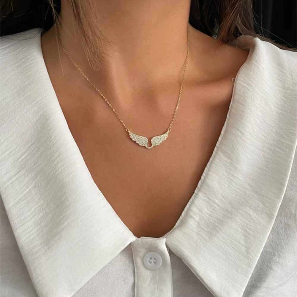 Collier pendentif ailes d'ange en or brillant