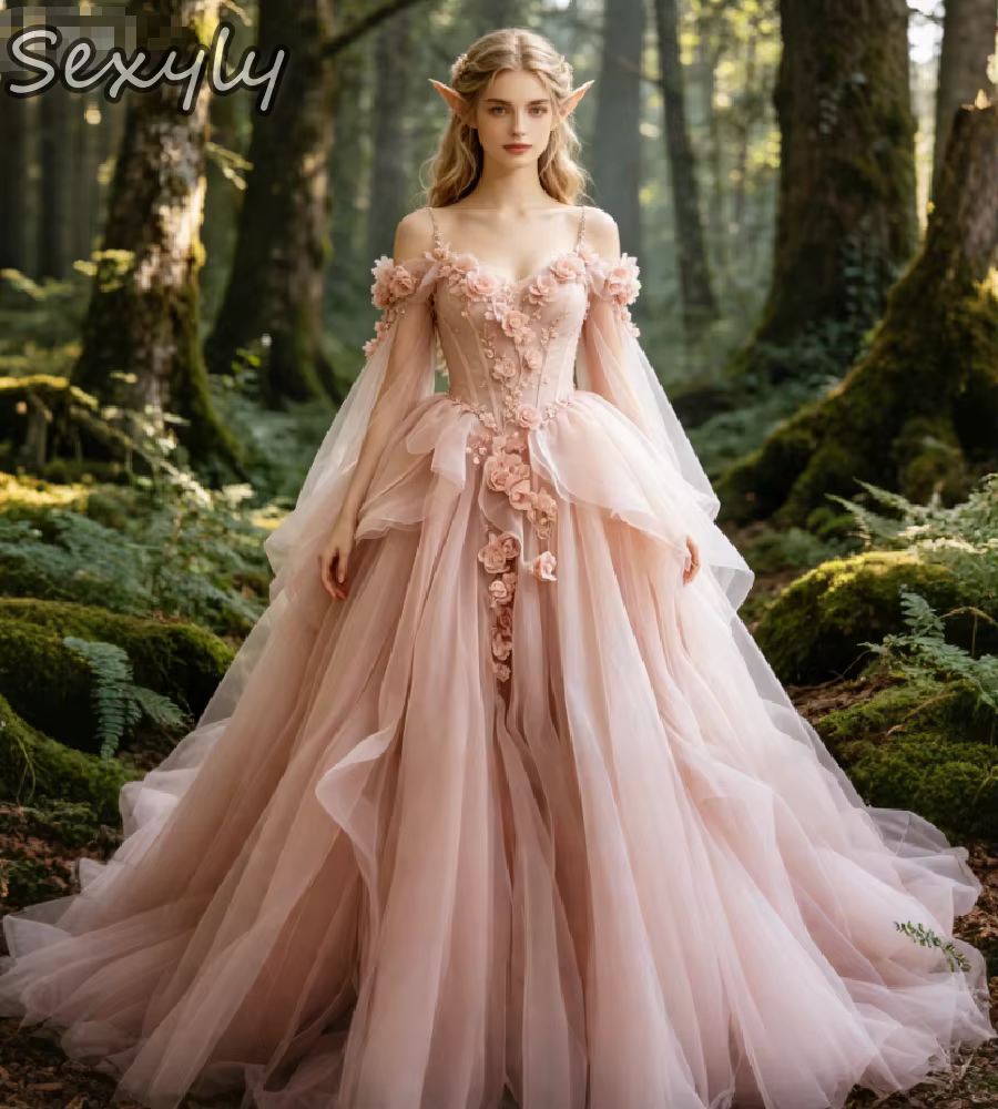 Robe de mariée féerique rose poudré