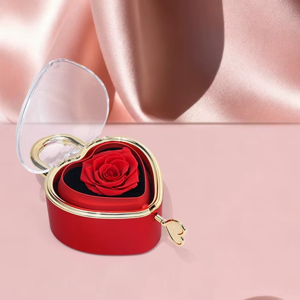 Boîte à bijoux en forme de cœur rotative