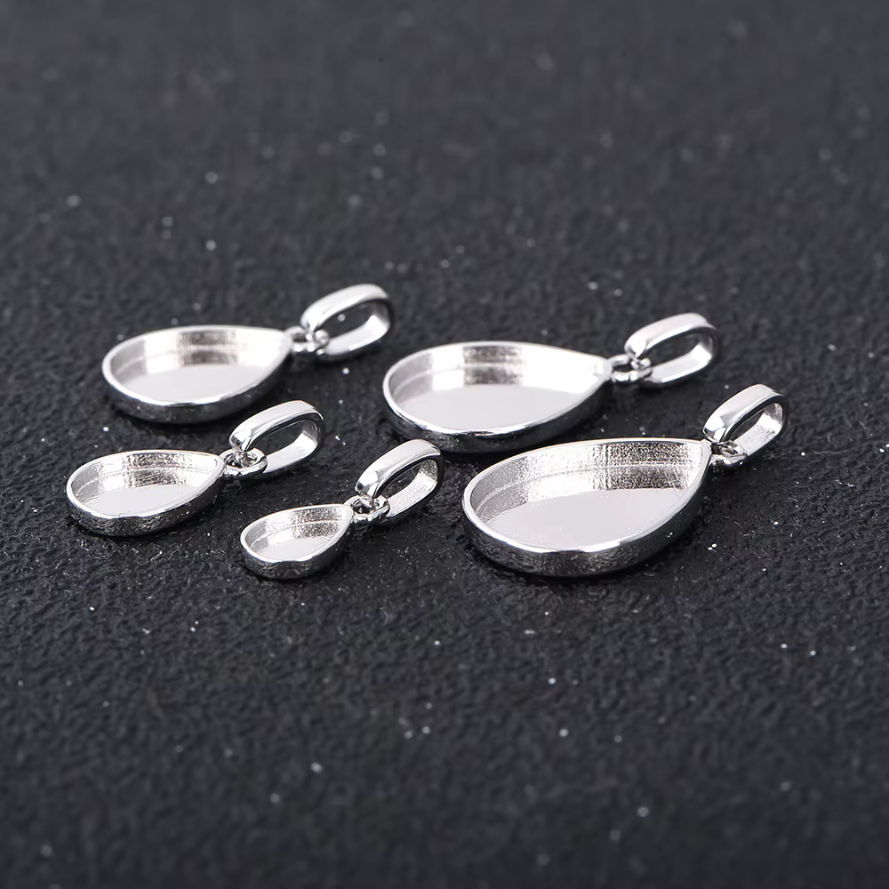 Paramètres de lunette de pendentif arrière solide de poire de résine de lait maternel
