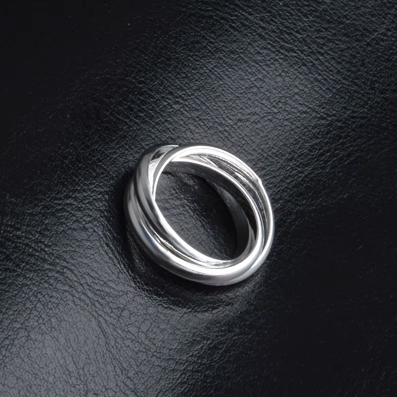 Bague de Couple Composée de Trois Petits Cowcles Argentés