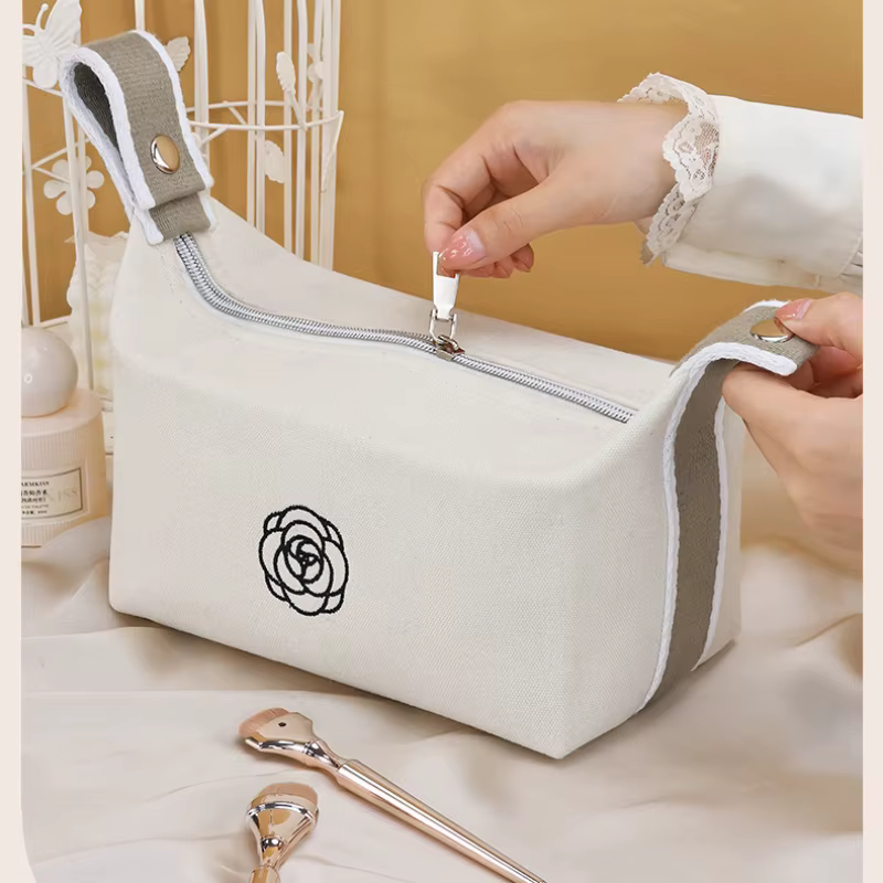 Trousse de maquillage portable en toile de camélia