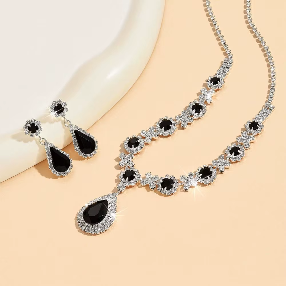 Parure de bijoux fantaisie en cristal : collier et boucles d'oreilles pendantes de luxe en forme de goutte d'eau