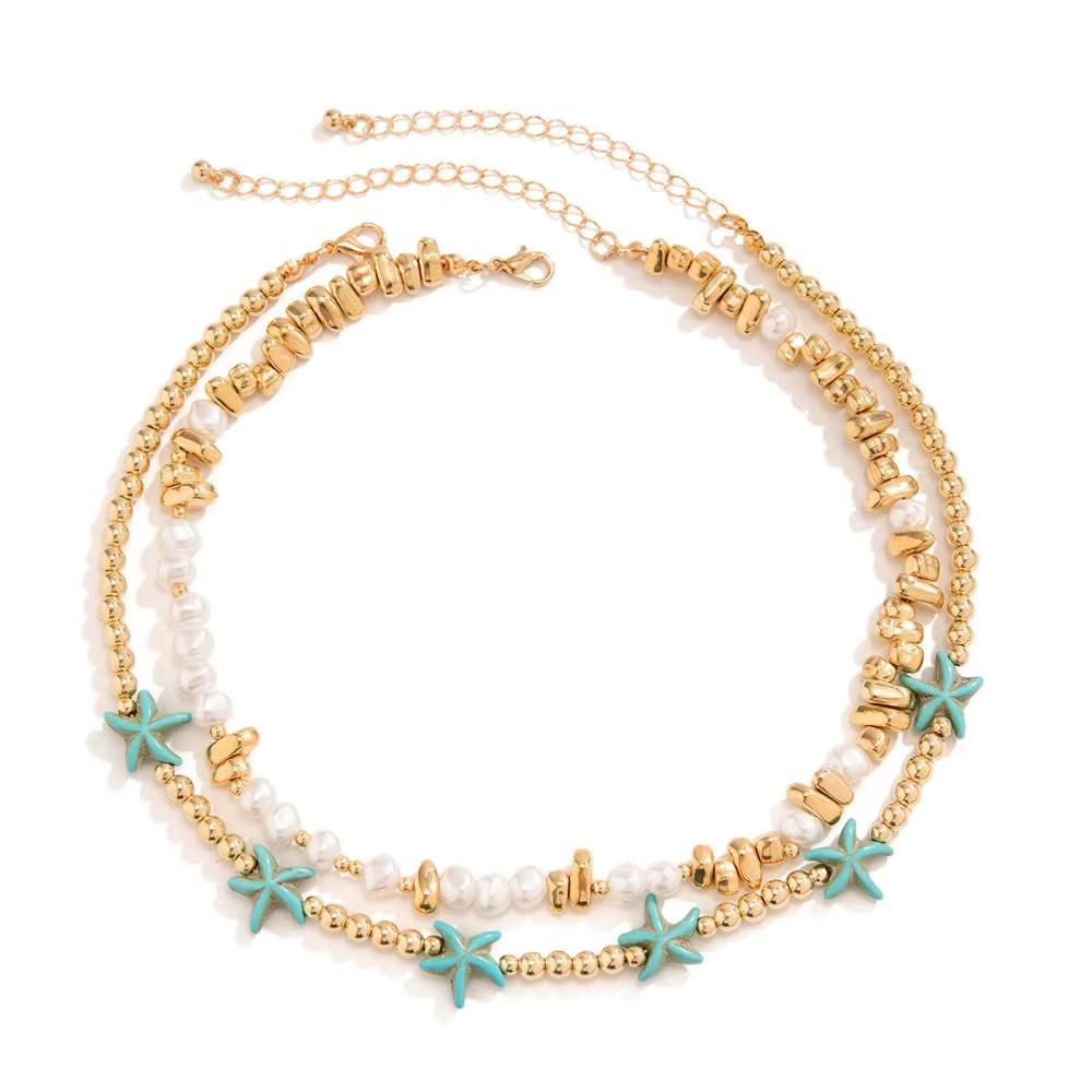 Collier avec pendentif coquillage et étoile de mer