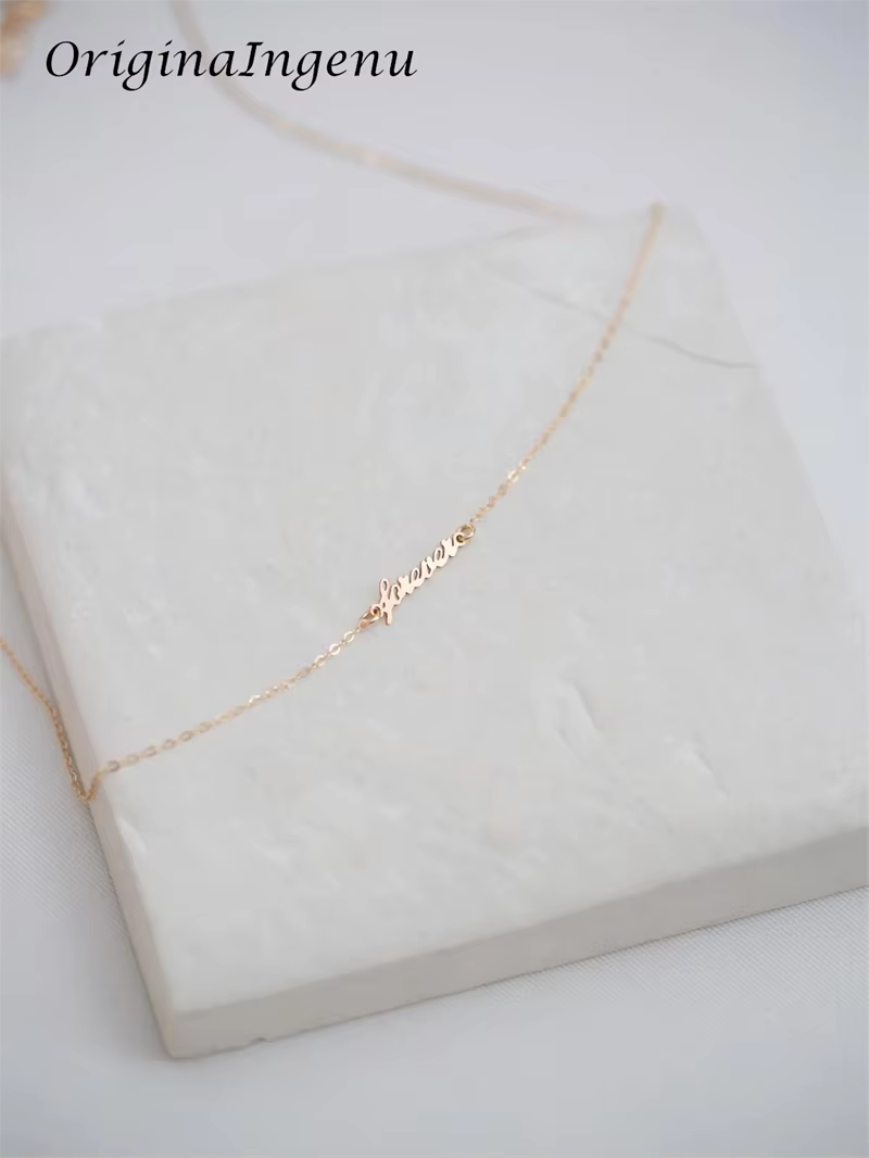 Collier à breloques en or 14 carats