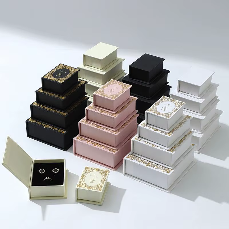 Boîte à bijoux magnétique en forme de livre