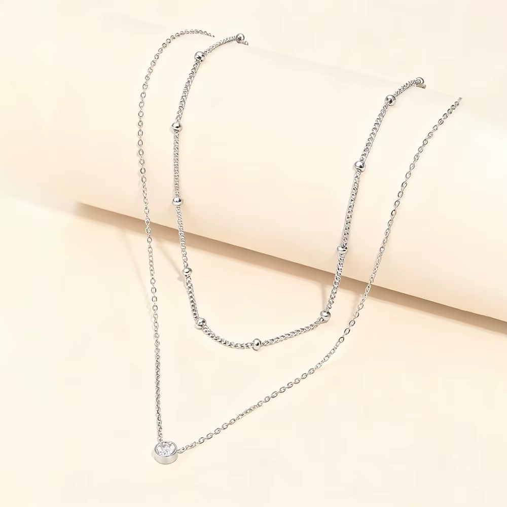 Colliers superposés dorés pour femmes