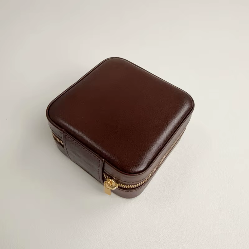 Boîte à bijoux pour collier portable multi-compartiments haut de gamme en cuir de vache ciré à l'huile de première
