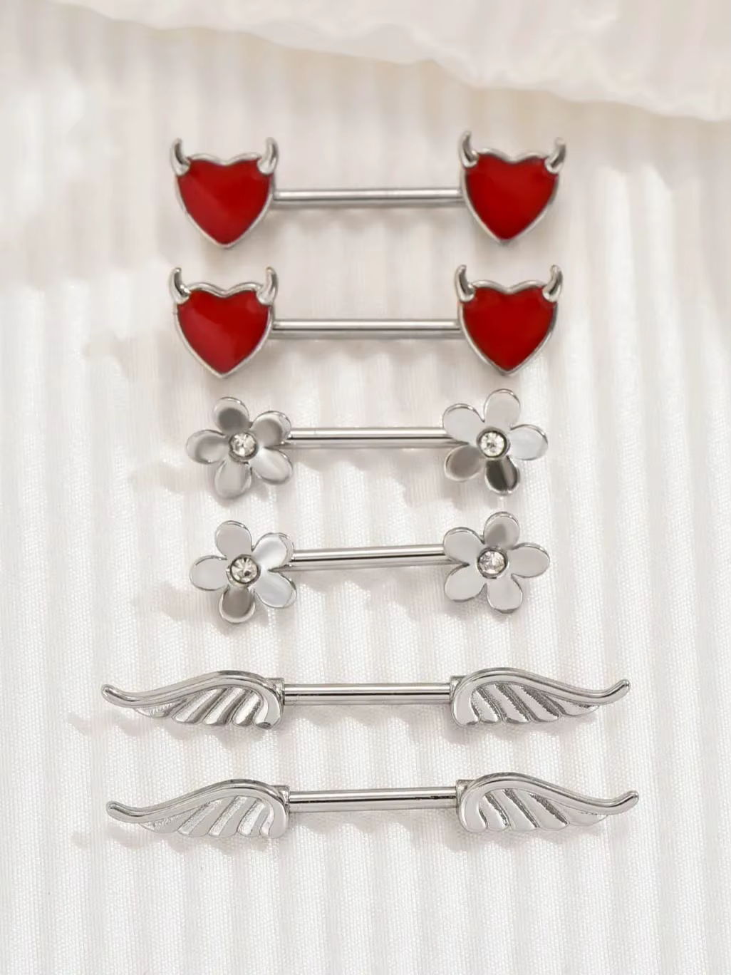 2 pièces Piercing de téton Ailes d'ange 14G