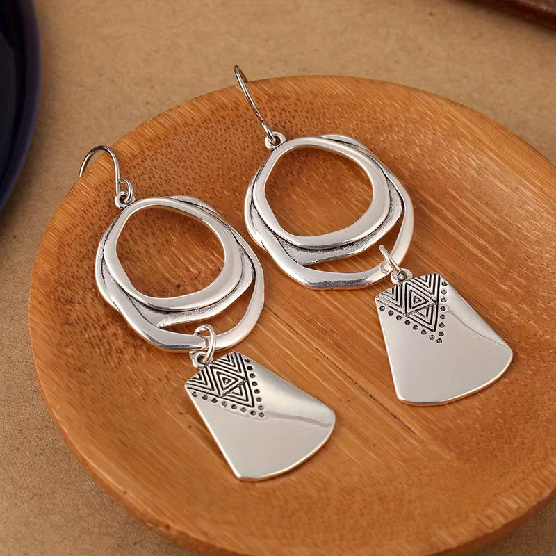 Boucles d'oreilles pendantes à motif géométrique rétro créatif