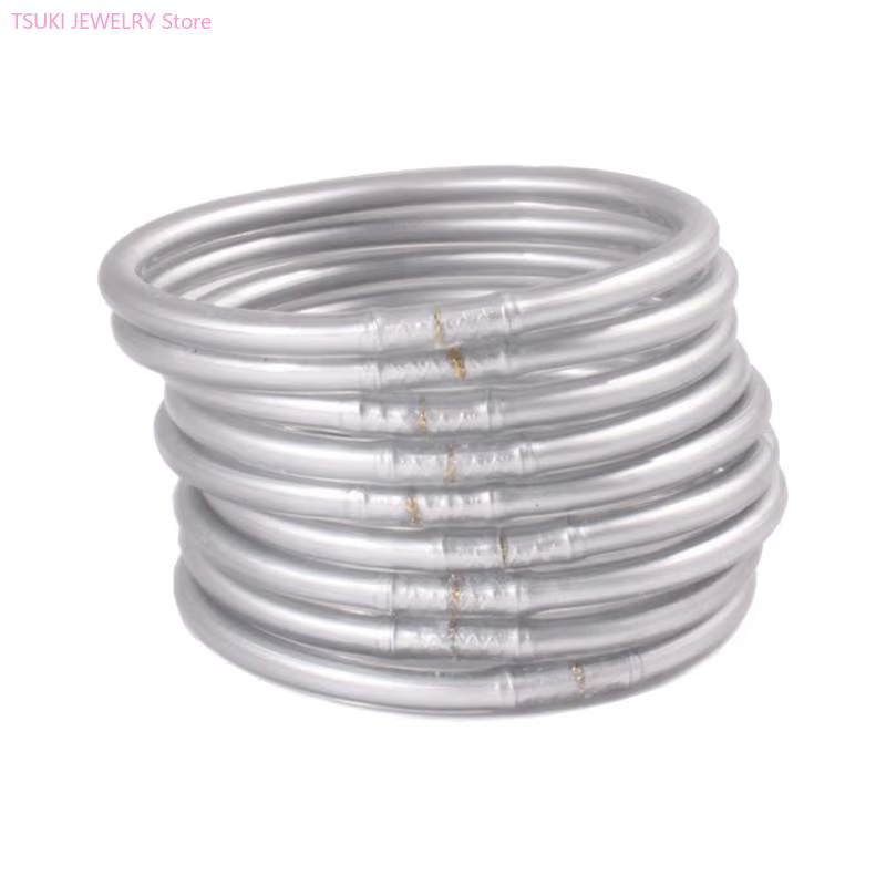 62KE – Bracelet gelée en plastique rempli feuille d'or clair