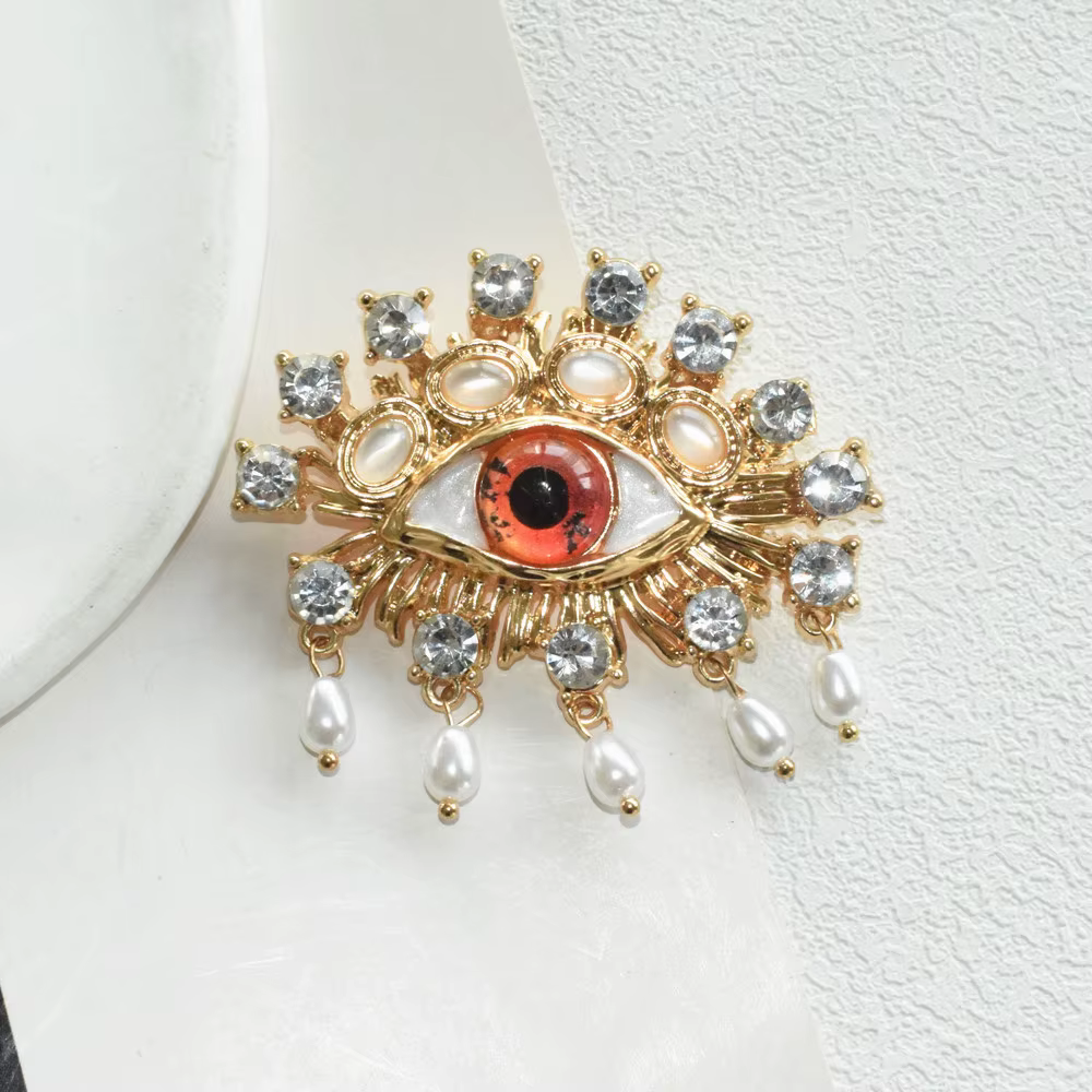 Broche Vintage en strass avec yeux en résine Orange pour femmes
