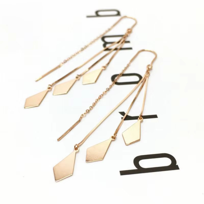 Boucles d'oreilles pompon diamant brillant pour femme