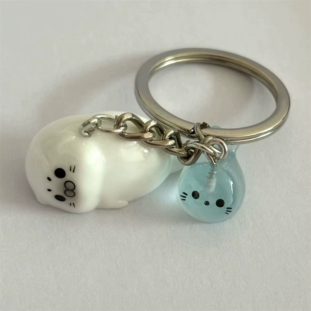 Mignon blanc 3D lumineux Lion de mer porte-clés clé pour femmes conception Simple Animal