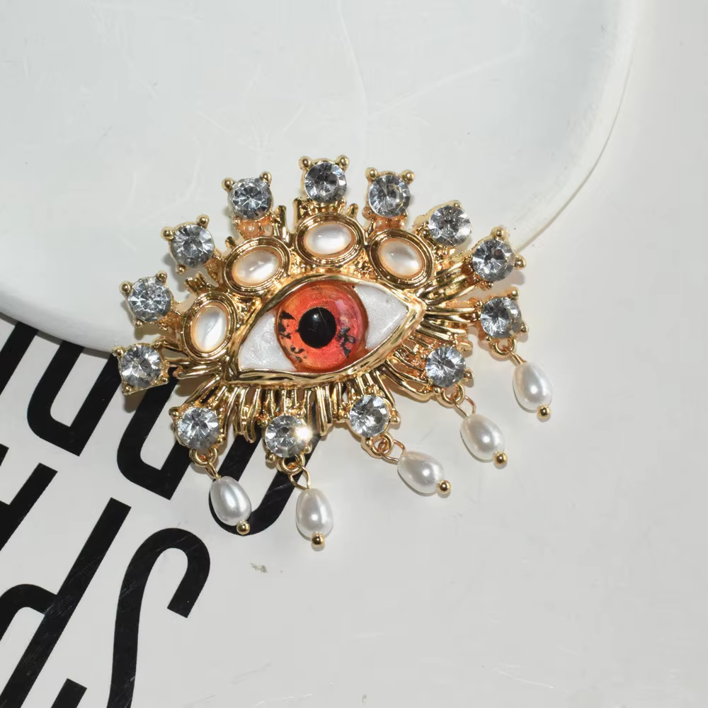 Broche Vintage en strass avec yeux en résine Orange pour femmes